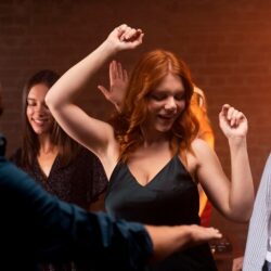 close-up-smiley-people-dancing_23-2149119627