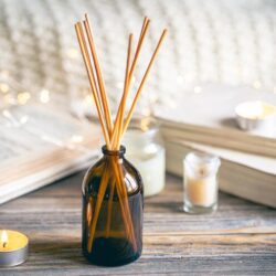 winter-spa-composition-with-incense-sticks-candles-bokeh-lights_169016-45129